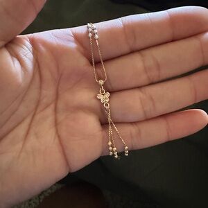 14K yellow Gold butterfly-shaped charm and dangling beads